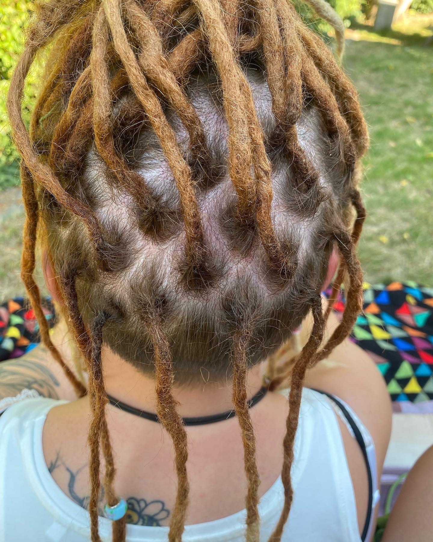 Ansatzpflege von Dreadlocks