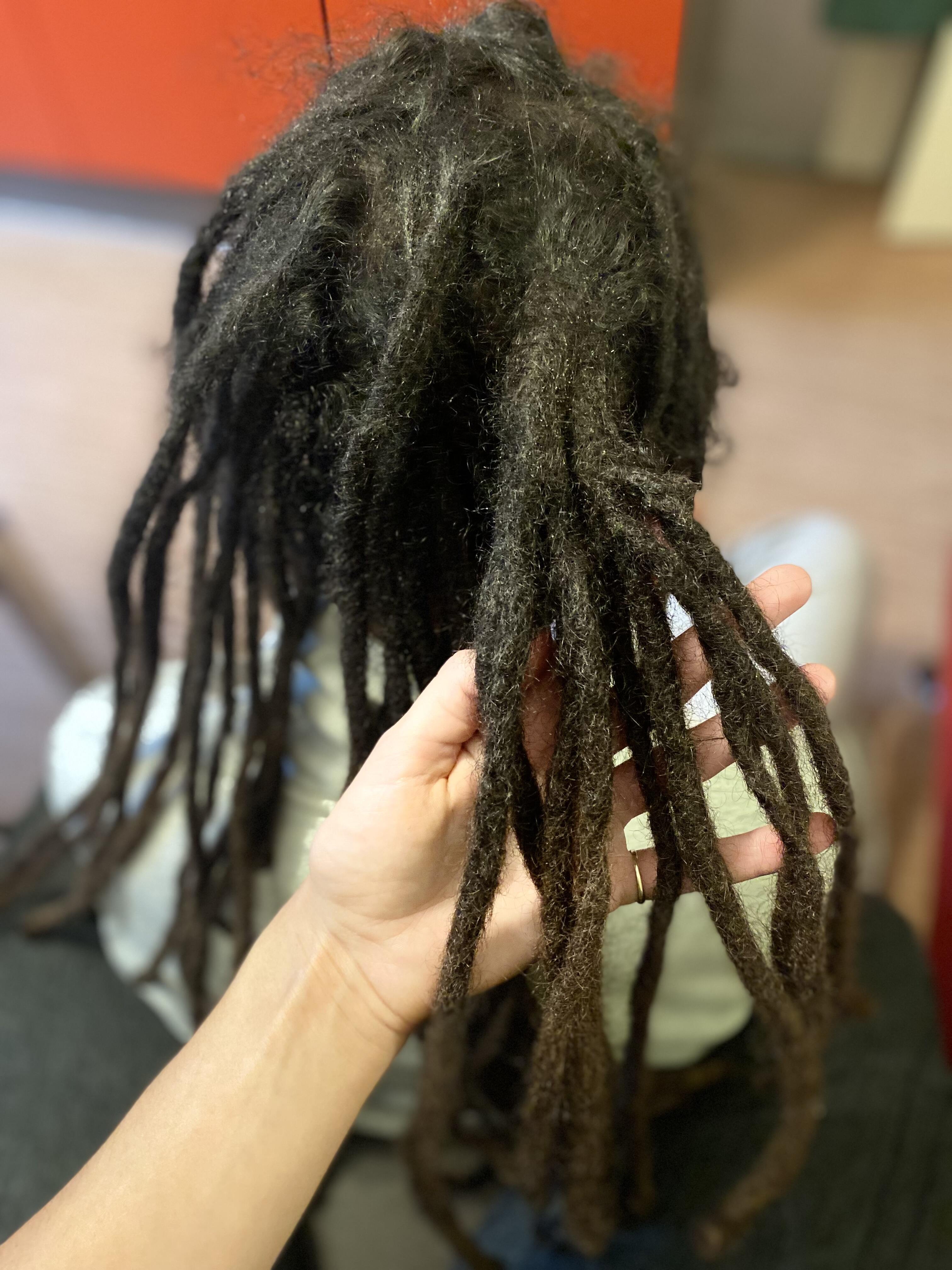 Dreadreparatur und Ansatzpflege